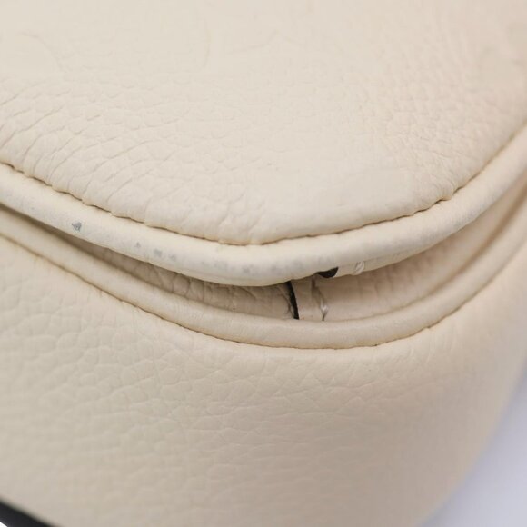 Louis Vuitton  Metis East West Pochette Empreinte Leather Crossbody Bag Cream - Picture 10 of 15